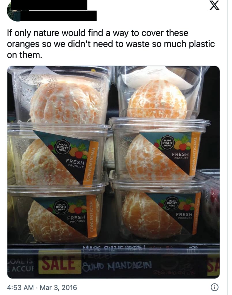 A screenshot of a tweet. The image in the tweet is a stack of transparent plastic boxes containing pre-peeled oranges. The text reads "if only nature would find a way to cover these oranges so we didn't need to waste so much plastic on them."